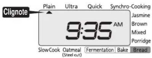 Tiger JKTS10U - Vérifiez l'heure actuelle. - 1