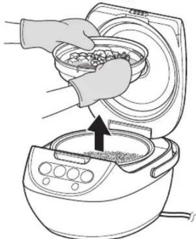 Tiger JBVA10U - Retirez le plateau de cuisson et égrenez le riz - 1