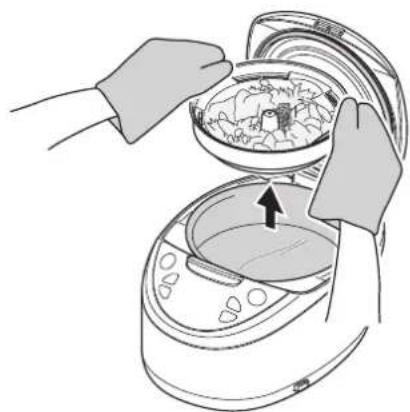 Tiger JAXT18U - Retirez le plateau de cuisson. - 1