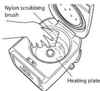 Tiger JAJA55U - Cleaning the heating plate - 1