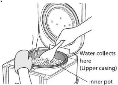 Tiger JAJA55U - Stir and loosen the cooked rice. - 1