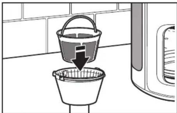 KITCHENAID KCM1202OB - Filling the brew basket with coffee - 2