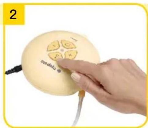 MEDELA Swing - Accendere il tiralatte con . - 2