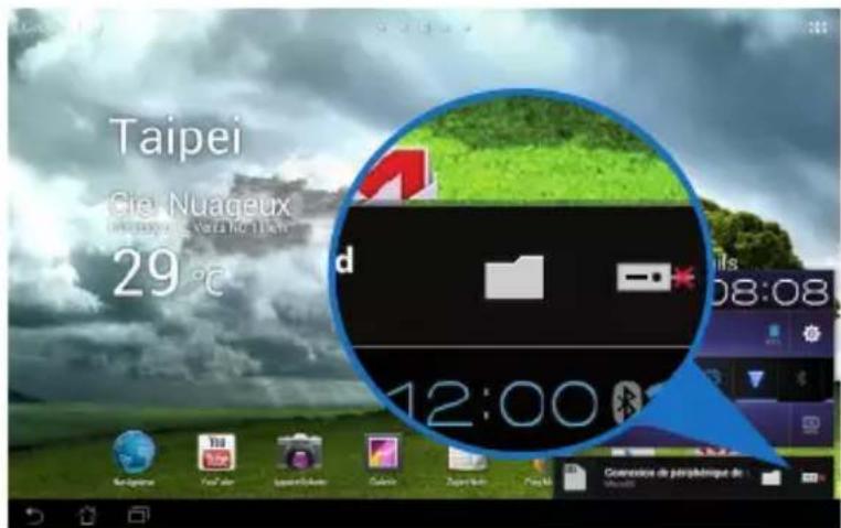 ASUS Transformer Pad TF300TL - Pour retirer la carte microSD : - 1