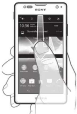 SONY ERICSSON Xperia TX - Pour ouvrir le volet de notification - 1