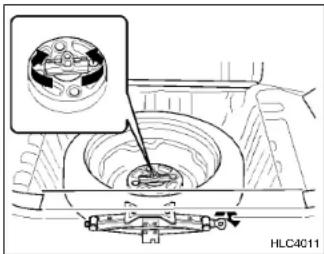 HYUNDAI Accent (2004) - Manipulation de la roue de secours - 1