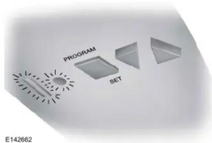 Lincoln MKC (2019) - Programmation du système HomeLink avec le moteur d'ouvre-porte de garage Genie Intellicode - 1