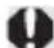 CANON EOS Rebel T7 - While pressing the lens release button, turn the lens as shown by the arrow. - 1