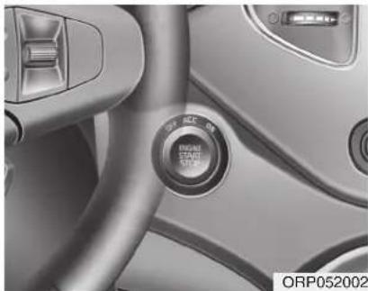 KIA Carens (2015) - Bouton démarrage/arrêt du moteur allumé - 1