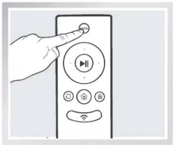Line drawing of a hand pointing at a remote control with 'AUTO' button and playback control icons