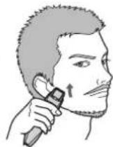 PANASONIC ERGB44 - Schneiden Sie ihren Bart langsam, indem Sie das Gerät von unten nach oben bewegen, wobei der Ein/Aus-Schalter nach außen zeigt. - 2