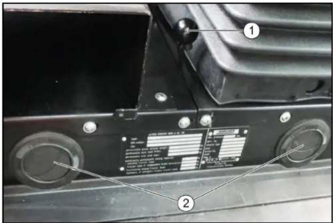 Technical diagram of a vehicle's front-mounted control panel with labeled parts and component details