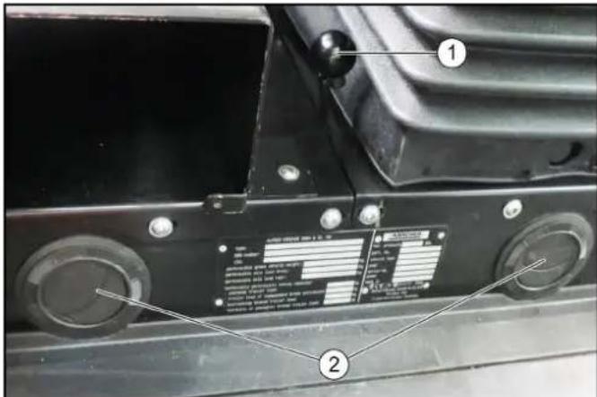 Technical diagram of a vehicle's front-mounted control panel with labeled parts and component details