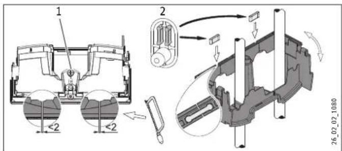 STIEBEL ELTRON DHE 18 SLi - Montaż dolnej części ścianki tylnej przy złączu śrubowym natynkowym - 1