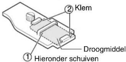 JVC WRMG100 - ② Breng het droogmiddel op de achterkant van de voetplaat aan. - 1