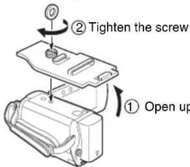JVC WRMG100 - ③ Attach the base to the bottom of the camera. - 1