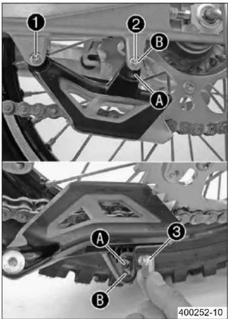 KTM 450 SXF (2009) - Ρύθμιση οδηγού αλυσίδας ↘ (XC-F) - 1