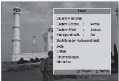 Extras Slideshow anhalten Diashow-Geschw. : Normal Diashow-Effekt : Jalousie Hintergrundmusik : Aus Einstellung der Hintergrundmusik Zoom Drehen Bildeinstellungen Information Eingabe Zurück