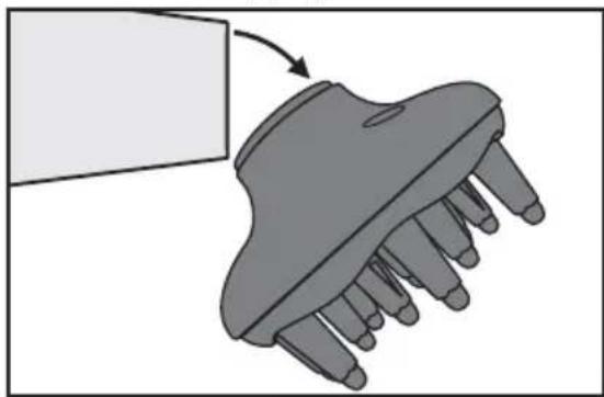 Illustration of a hairdryer with a hand holding the blade, showing no text or symbols
