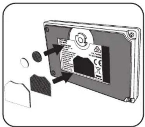 Diagram showing a device with a label and warning arrows, indicating a safety or hazard warning.