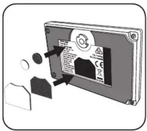 Diagram showing a device with warning label and surrounding components, including a magnified view of its internal structure.