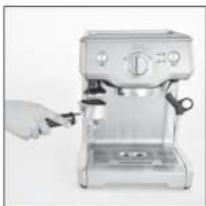 Solis Barista Perfect 118 - TAMPING THE COFFEE GROUNDS WITH THE TAMPER - 1