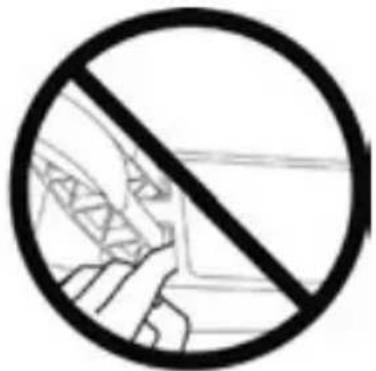 Prohibition sign with a circular outline and hand holding a vehicle, indicating no use or prohibition.