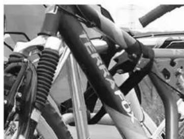 Pro-User Amber IV - Now secure the bikes using the long safety belt. - 1