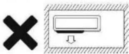 Diagram showing a black 'X' symbol and a rectangular device with a downward arrow, enclosed in a hatched border.