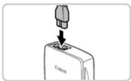 CANON PowerShot SX500 IS - Zložte kryt batérié a vložte batériu do nabíjáčky. - 1