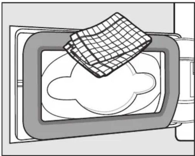 MIELE PDR 50008 CH HP - Nettoyer et fermer la trappe des filtres à peluches - 1