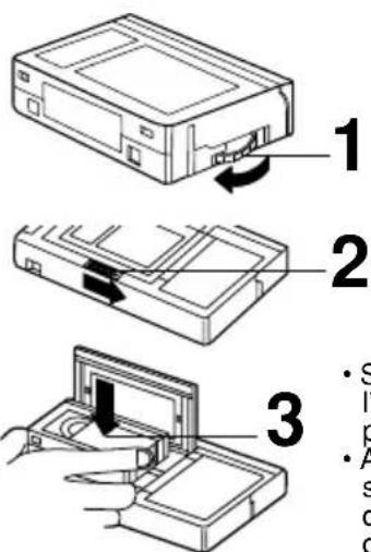 PANASONIC Palmcorder PVL552 - Insertion de la cassette VHSC - 1