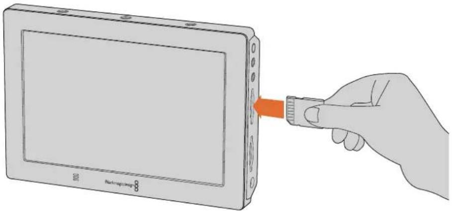 Blackmagic Design Video Assist 4K digital video recorder - To plug in an SD card: - 1