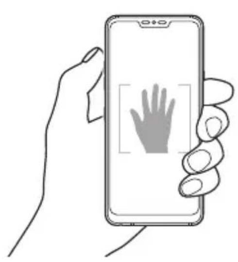 LG LMG710EM - Cliché pris avec un geste de la main - 1