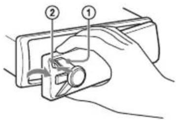 Diagram showing a hand holding a tool with labeled parts 1 and 2, indicating a step in the process.