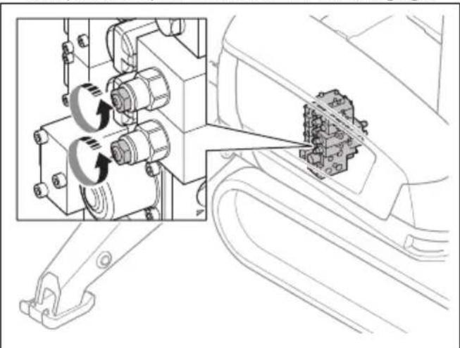 HUSQVARNA TC 130 - Actionnement du dispositif d'abaisissement d'urgence (DXR 275, DXR 305, DXR 315) - 1
