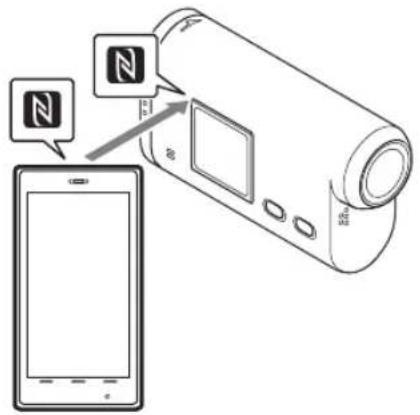 SONY HDRAS30VW - 3Touchez le téléphone intelligent sur le camoscope. - 1