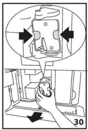 Diagram showing a hand holding a small object in a control room, with arrows indicating direction and number 30 visible.