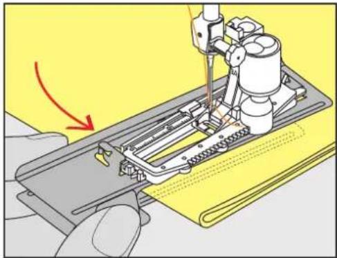BERNINA 590 - Utiliser l'aide d'avancement - 1