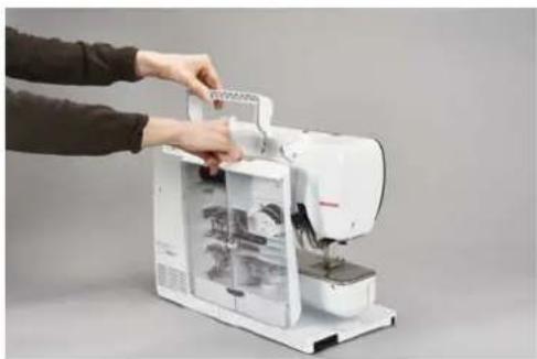 BERNINA 590 - Retrait et montage du coffret d'accessoires de la machine - 1