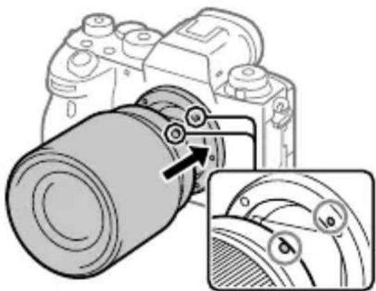 SONY Alpha A9 II - Mount the lens by aligning the two white index marks (mounting indexes) on the lens and camera. - 1