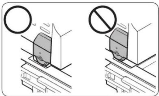 Two technical diagrams showing a vehicle on tracks with a circular warning symbol and a prohibition sign (no text or labels present)