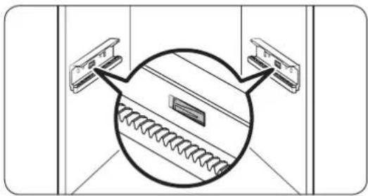 Diagram showing two devices connected to a central device with coiled spring, enclosed in a circle (no text or symbols)