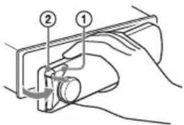 Diagram showing a hand operating a mechanical device with labeled parts 1 and 2, indicating a step or operation.