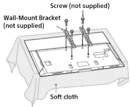 SONY KD49X720E - Attach the Wall-Mount Bracket (not supplied) using the screws (not supplied). - 1