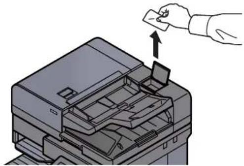 KYOCERA TASKalfa 4012i - Retirer le chiffon de nettoyage de son compartment. - 1