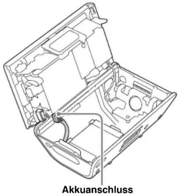 SONY NVU80 - Losen Sie den Akkuanschluss. - 1