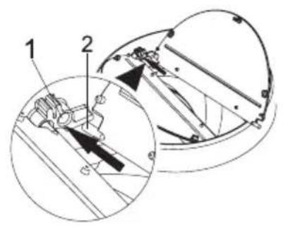 Technical diagram showing mechanical assembly with labeled parts and a magnified inset view of a component detail.