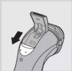 PHILIPS HQ8260CC - De trimmer schoonmaken met het bijgeleverde borsteltje - 1