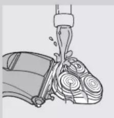 PHILIPS HQ8260CC - Die Schereinheit unter flieBendem Wasser reinigen - 3